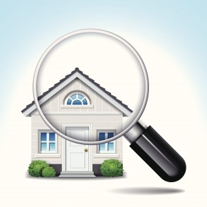 house & magnifying glass